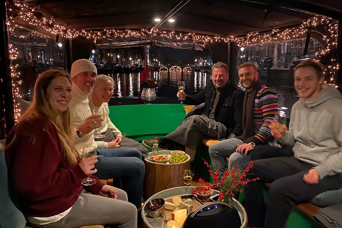 Light Event Amsterdam by small boat, 8 passengers max! You won't find any better - Captain Brian and Mathilda set the tone
