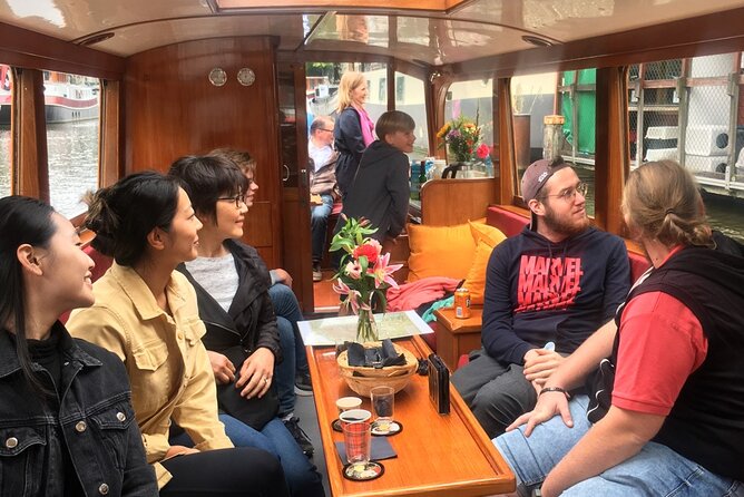 Morning Canal Cruise Amsterdam in Small-Group - Comfort in cold, wet, or changeable weather