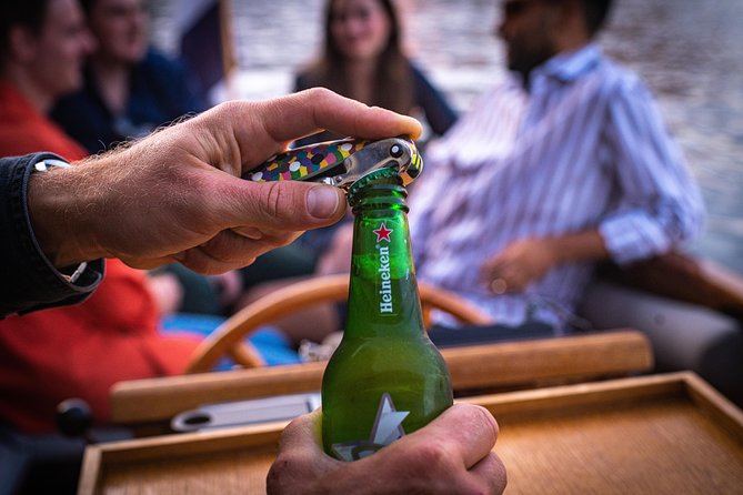 Private Boat Tour Amsterdam - 90 Min incl. welcome drink on historic saloon boat - Drinks, comfort, and the onboard setup