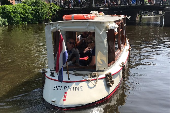 Private canal cruise on small historic boat - The Amstel, Amstel locks, and Skinny Bridge