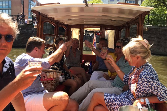 Private canal cruise on small historic boat - Rembrandt’s corner and the dancing houses