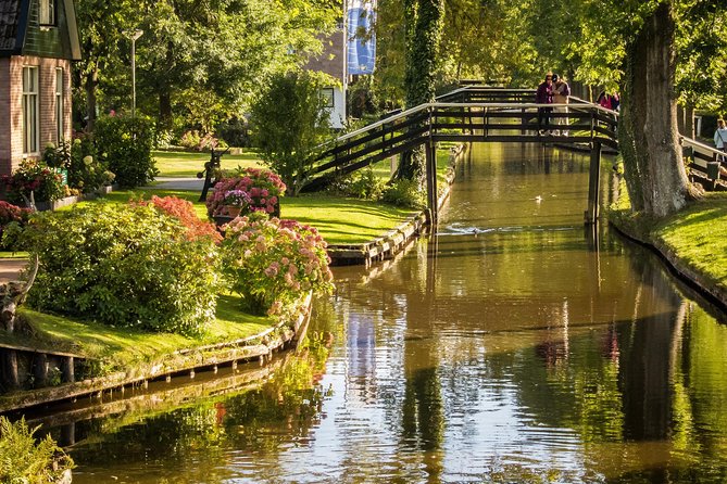 Private Day Trip from Amsterdam to Giethoorn including boat tour - Walking through Giethoorn’s canal-side homes