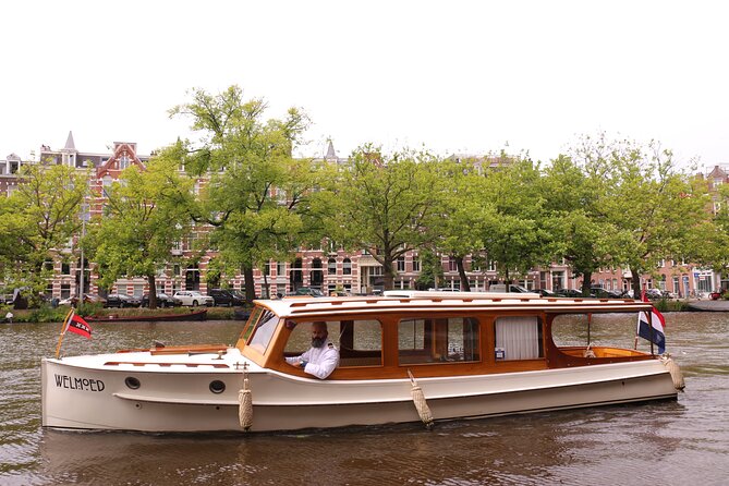 Private Guided Historic Amsterdam Canal Cruise in a Salon Boat - Morning, afternoon, or sunset?