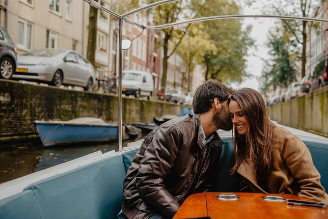 Private Romantic Canal Cruise Amsterdam with Bubbly and Snacks - Monet’s Bridge of Love and the medieval harbor story