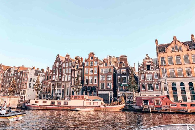 Private Romantic Canal Cruise Amsterdam with Bubbly and Snacks - Prosecco, cheese, stroopwafels, and practical comfort