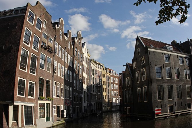 Private Tour: Amsterdam's City Highlights and Hidden Gems - Begijnhof and Dam Square: quiet beginnings, public power