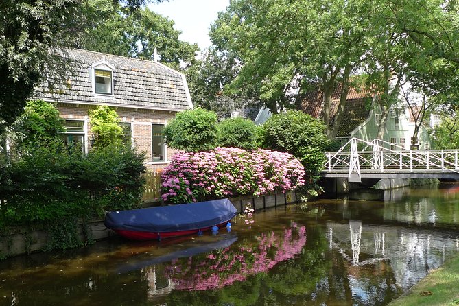 Private Tour Zaanse Schans Windmills and Volendam in Jaguar - The guide’s personal touch