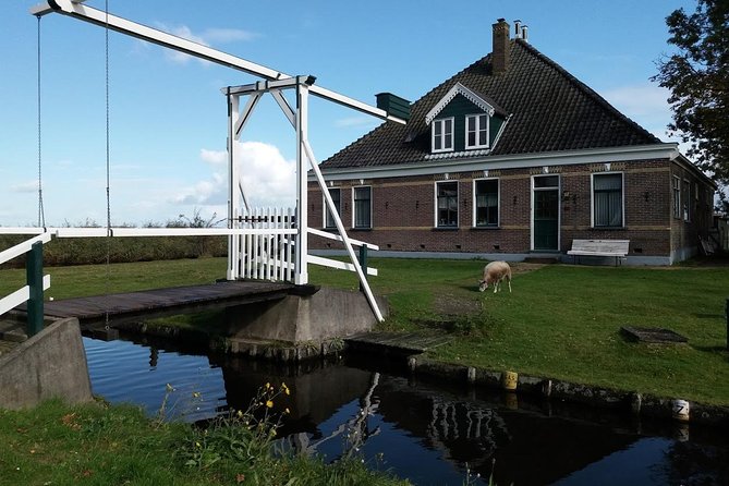 Small-Group Guided Sunset Canoe Tour in Waterland with Dinner - Stories about land reclaimed from the sea