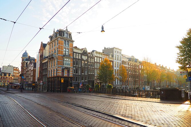 Small Group LGBTQ+ History Tour in Amsterdam - Munt Tower: a shopkeeper facing state violence