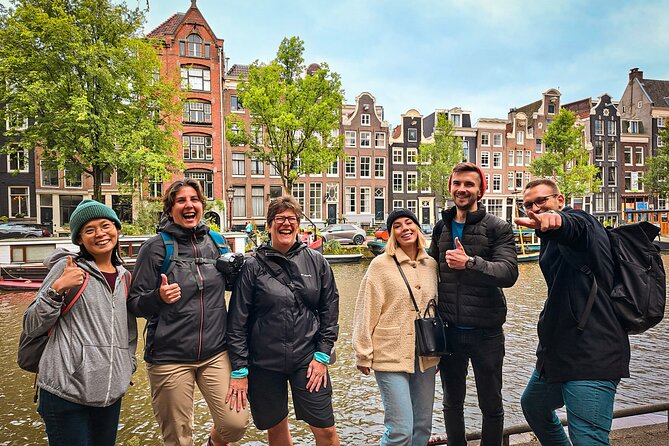 Small Group Walking Tour - Hello Amsterdam - Haarlemmersluis and the reality of Amsterdam by bicycle