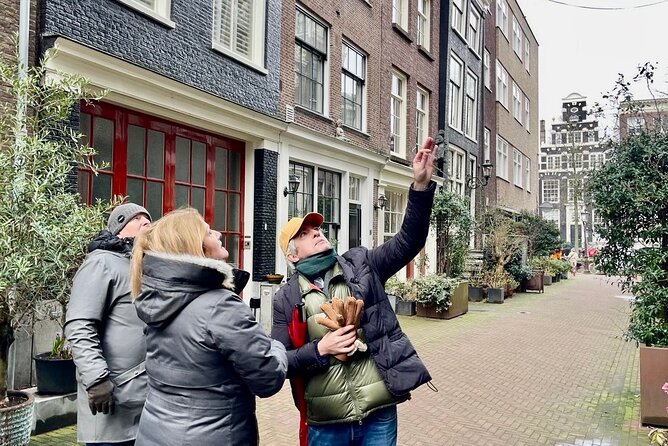 Small Group Walking Tour in Amsterdam with Friendly and Fun Guide - Begijnhof and Amsterdam’s quieter history