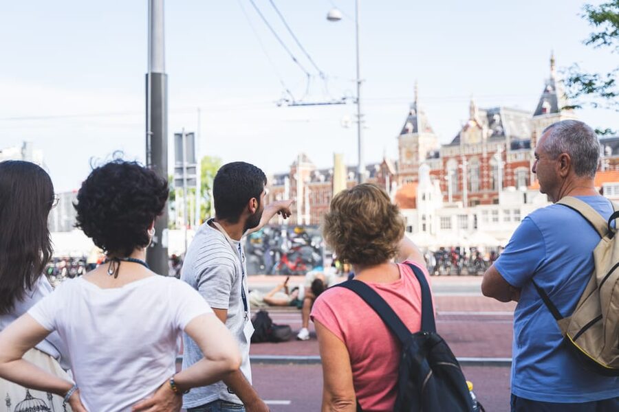 Small-Group Walking Tour with Amsterdam Canal Cruise - Starting at Beursplein and Dam Square