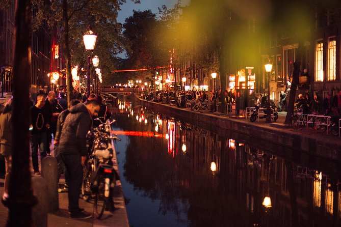Treasures of Amsterdam: Coffeeshops & Red Light District Private Tour - Zeedijk, Chinatown, and the city beyond the windows