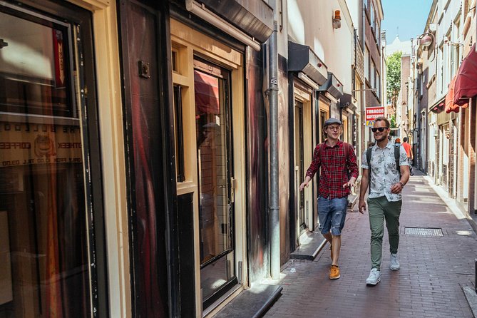 Treasures of Amsterdam: Coffeeshops & Red Light District Private Tour - Timing, weather, and the physical side of the walk