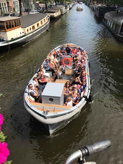 Visit Amsterdam by Boat with a French Guide (french) - Starting at Oosterdokskade beside Sea Palace