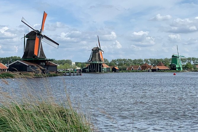 Visit Amsterdam Countryside with windmills by bike - Leaving Amsterdam by train and bicycle